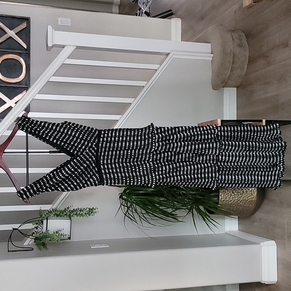 LULUS Pleated Tiered Dress In Black Polka Dot - Picture 3 of 11